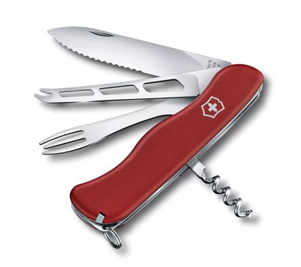 Scyzoryk Victorinox Cheese Master z czerwoną rękojeścią, nożem do sera, widelcem do fondue i korkociągiem.