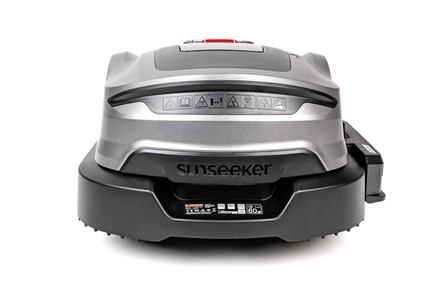 Robot koszący Sunseeker Elite X3 Gen 2 pracujący w ogrodzie bez przewodu ograniczającego.