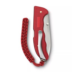 Scyzoryk Victorinox Evoke Alox w czerwonej rękojeści, z ostrzem ze stali nierdzewnej, zwycięzca w konkursie Red Dot 2023, z zawieszką z paracordu.